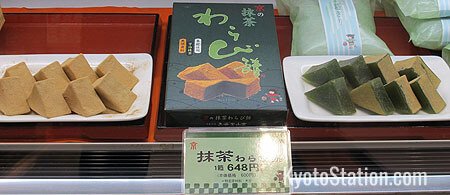 Warabimochi. Those on the right have been flavored with matcha powdered green tea