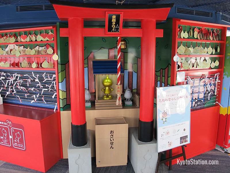 The observation deck’s shrine featuring the tower mascot in gold
