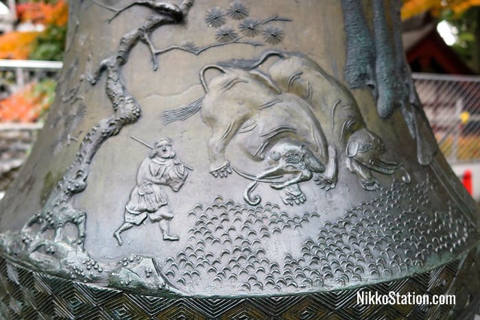 A detail of the elephants on one of the bronze lanterns