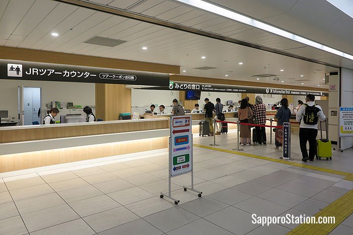 A tour counter, ticket office and information counter at New Chitose Airport Station