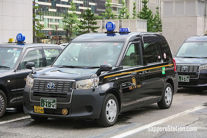 A Daichi taxi. The blue logo contains the name Daichi written in the characters 第一