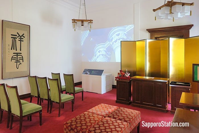 Videos are projected on the walls of the Tsubaki ceremonial room