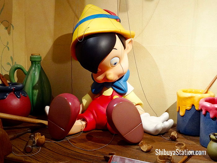 Pinocchio features in a mockup of Geppetto's workshop at the Disney Store