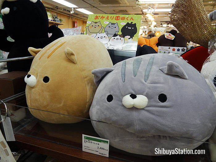 Furry feline cushions at Tokyu Hands