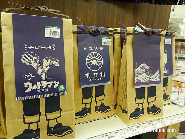 Old school Japanese denim aprons featuring Ultraman and Edo Period motifs