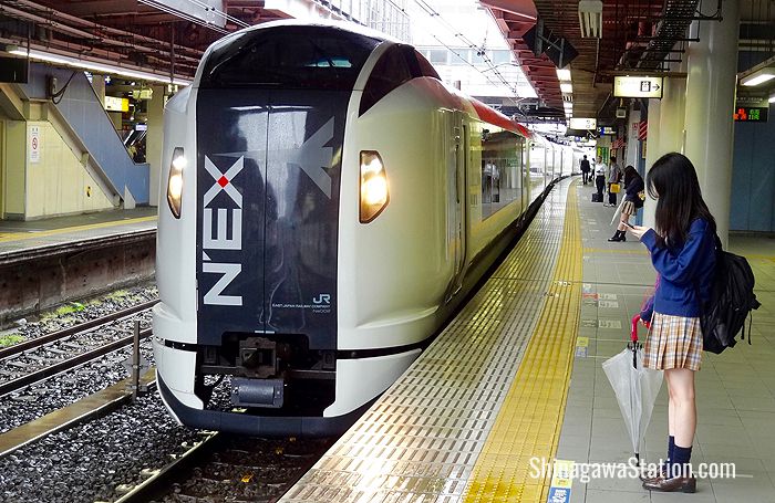 A Narita Express train arrives on Track 15 at Shinagawa Station in Tokyo