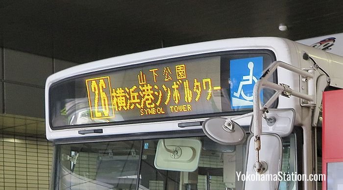 Check the destination displayed at the front of the bus
