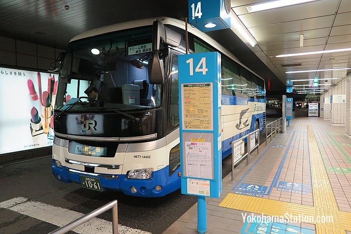 A bus for Akita at bus stop 14