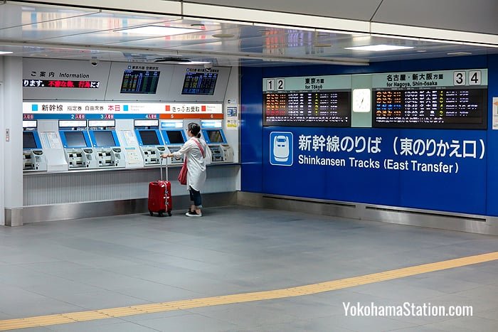 Shinkansen ticket machines beside the transfer gates