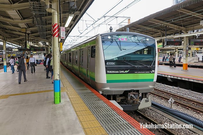 A train for Hachioji at Platform 4